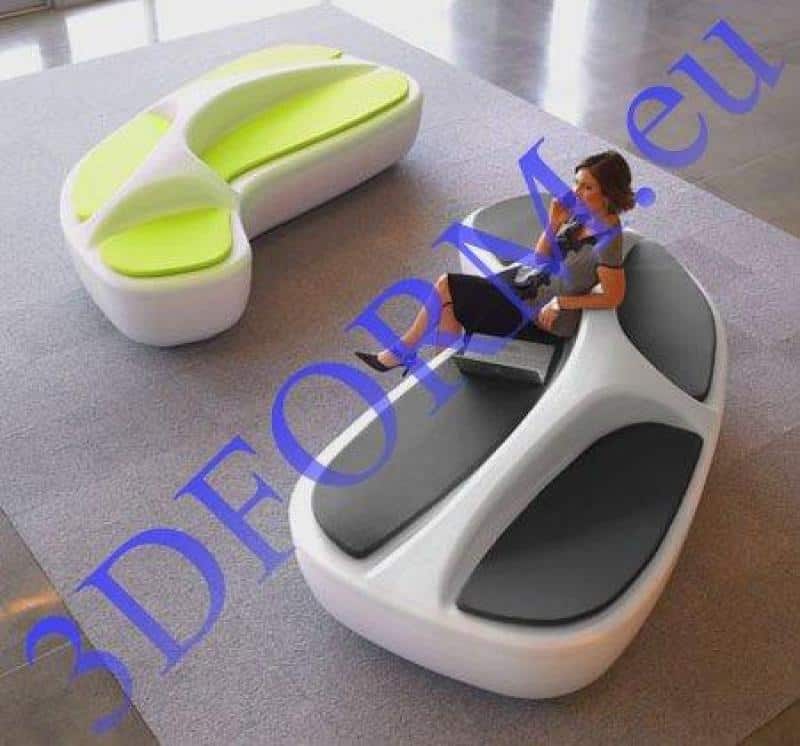 Ławka dla TESCO - indoor/outdoor 2 Nowoczesne, designerskie ławki w futurystycznym stylu w przestronnym wnętrzu. Na jednej z nich siedzi osoba.